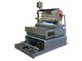 Box wrapping machine with packing tunnel
